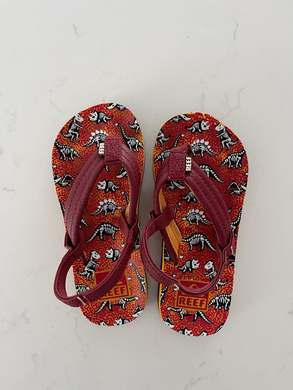 • reef kids flip flops •
